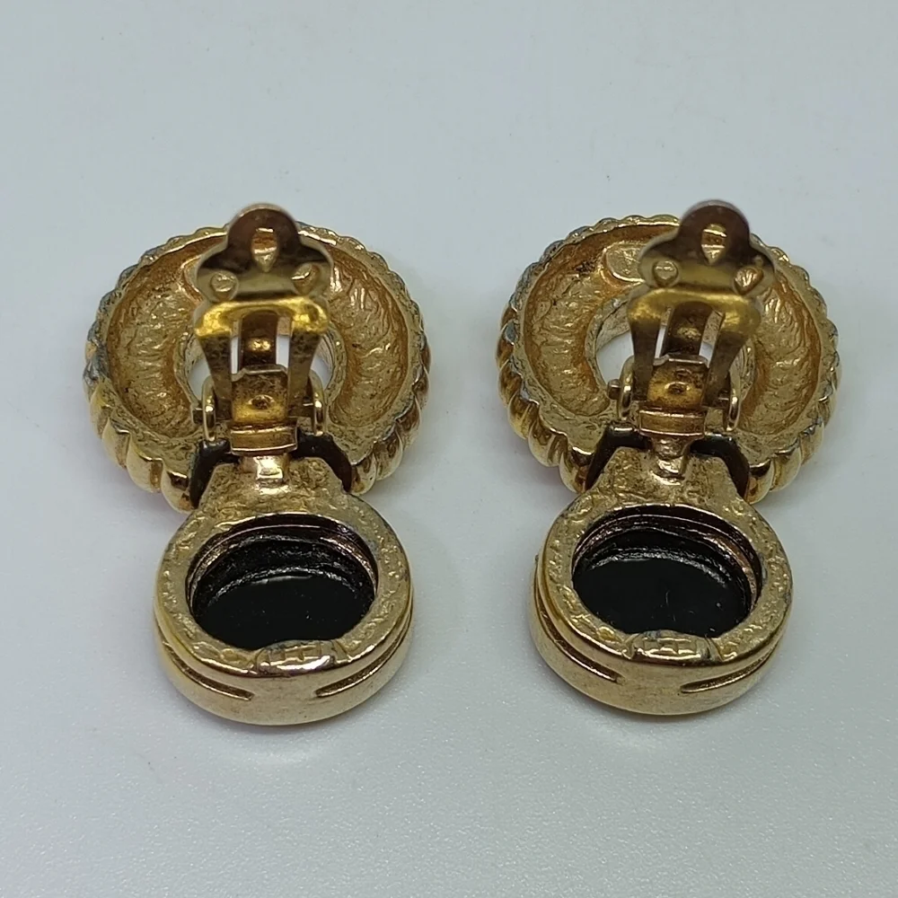 * vintage Panetta black and gold tone clip on earrings